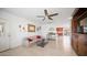 Light-filled living room, view of kitchen and entryway at 3737 W Morrow Dr, Glendale, AZ 85308