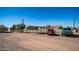 Gravel parking area with a covered structure for vehicles at 3737 W Morrow Dr, Glendale, AZ 85308