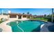 Relaxing kidney-shaped pool with grassy backyard at 3737 W Morrow Dr, Glendale, AZ 85308