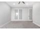 Simple bedroom with carpet and frosted glass doors at 3918 W Bowen Ave, Glendale, AZ 85308