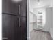 Spacious walk-in closet with dark wood cabinets at 3918 W Bowen Ave, Glendale, AZ 85308