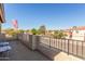 Balcony overlooking a suburban neighborhood with palm trees under a clear blue sky at 4263 W Jasper Dr, Chandler, AZ 85226