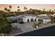 Luxury home with circular driveway and mountain backdrop at 4712 E Palo Verde Dr, Phoenix, AZ 85018