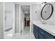 Bathroom with double vanity, walk-in shower, and separate closet at 4712 E Palo Verde Dr, Phoenix, AZ 85018