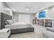 Spacious primary bedroom with built-in shelving and ensuite access at 4712 E Palo Verde Dr, Phoenix, AZ 85018