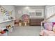 bedroom featuring a dollhouse and ample toy storage at 4712 E Palo Verde Dr, Phoenix, AZ 85018