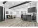 Modern dining room with a dark wood table and gray chairs at 4712 E Palo Verde Dr, Phoenix, AZ 85018
