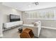 Sitting area with TV and comfortable seating at 4712 E Palo Verde Dr, Phoenix, AZ 85018