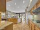 Kitchen with granite countertops, island, and ample cabinet space at 6623 W Robin Ln, Glendale, AZ 85310