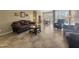 Bright living room featuring tile floors and ample natural light at 6623 W Robin Ln, Glendale, AZ 85310