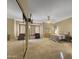 Spacious main bedroom with ceiling fan and large windows at 6623 W Robin Ln, Glendale, AZ 85310