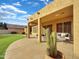 Covered patio with seating area, offering ample shade at 6623 W Robin Ln, Glendale, AZ 85310