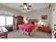 Bedroom with a wooden bed frame and a wooden desk at 815 E Silverwood Dr, Phoenix, AZ 85048