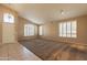 Spacious living room with high ceilings and neutral carpeting at 9071 E Rockwood Dr, Scottsdale, AZ 85255