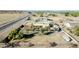 Aerial view of house, RV, and surrounding land at 9109 S 220Th Dr, Buckeye, AZ 85326