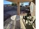 Covered patio with pavers and seating area at 12103 W Rosewood Dr, El Mirage, AZ 85335