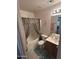 Clean bathroom with tub shower combo and vanity at 12103 W Rosewood Dr, El Mirage, AZ 85335