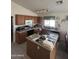 Kitchen with island and ample cabinet space at 12103 W Rosewood Dr, El Mirage, AZ 85335