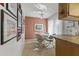 Cozy breakfast nook with a round table and four chairs, adjacent to kitchen at 13416 N Cedar Dr, Sun City, AZ 85351