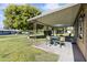 Covered patio with seating area and view of the backyard at 13416 N Cedar Dr, Sun City, AZ 85351