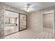 Bright dining area with tile floors and access to a sunroom at 13907 W Terra Vista Dr, Sun City West, AZ 85375