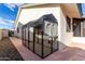 Outdoor dog kennel with cover at 13907 W Terra Vista Dr, Sun City West, AZ 85375