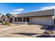 Single-story home with a two-car garage and landscaping at 13907 W Terra Vista Dr, Sun City West, AZ 85375