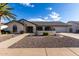 Single-story home with landscaped front yard and driveway at 13907 W Terra Vista Dr, Sun City West, AZ 85375