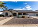 Single-story home with landscaped front yard and driveway at 13907 W Terra Vista Dr, Sun City West, AZ 85375