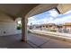 Covered patio with arched entryway and wrought-iron fence at 13907 W Terra Vista Dr, Sun City West, AZ 85375