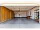 Spacious garage with storage cabinets at 13907 W Terra Vista Dr, Sun City West, AZ 85375