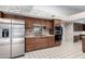 Kitchen boasts stainless steel appliances and ample cabinetry at 13907 W Terra Vista Dr, Sun City West, AZ 85375