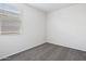 Simple bedroom with neutral carpeting and window at 1402 W Hess Ave, Coolidge, AZ 85128