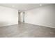 Bright and airy living room with tile flooring at 1402 W Hess Ave, Coolidge, AZ 85128