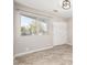 Well-lit bedroom with tile floors and window at 1434 E Detroit St, Chandler, AZ 85225