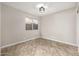 Simple bedroom with tile floors and window at 1434 E Detroit St, Chandler, AZ 85225