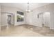 Dining area with tile floors and a chandelier at 1434 E Detroit St, Chandler, AZ 85225