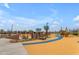 Modern playground with climbing structures and play equipment at 1434 W Ridge Rd, Apache Junction, AZ 85120