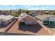 House with backyard and surrounding neighborhood view at 14848 W Edgemont Ave, Goodyear, AZ 85395