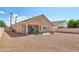 Covered patio with gravel yard and modern two story home at 14848 W Edgemont Ave, Goodyear, AZ 85395