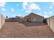 Large backyard with gravel and privacy walls at 14848 W Edgemont Ave, Goodyear, AZ 85395