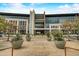 Modern building with large windows and landscaping in Goodyear, AZ at 14848 W Edgemont Ave, Goodyear, AZ 85395