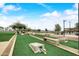 Cornhole game area in a community setting with lush lawn at 14848 W Edgemont Ave, Goodyear, AZ 85395