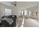 Bright and spacious living room with comfortable seating and natural light at 14848 W Edgemont Ave, Goodyear, AZ 85395