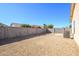 Backyard with gravel and block wall at 15819 W Crocus Dr, Surprise, AZ 85379