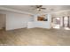 Open living room and kitchen with tile floors at 15819 W Crocus Dr, Surprise, AZ 85379