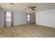 Bright living room featuring tile floors and neutral walls at 15819 W Crocus Dr, Surprise, AZ 85379