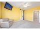 Bedroom featuring a sliding barn door and neutral wall colors at 15920 W Summerwalk Dr, Surprise, AZ 85374