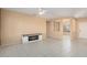 Living room with fireplace and tile flooring at 15920 W Summerwalk Dr, Surprise, AZ 85374