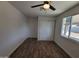 Spacious bedroom with double door closet and wood flooring at 1633 N 62Nd Ave, Phoenix, AZ 85035